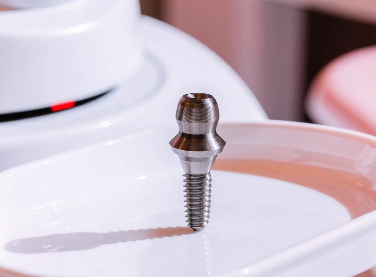 Titanium dental implant components (illustrative)